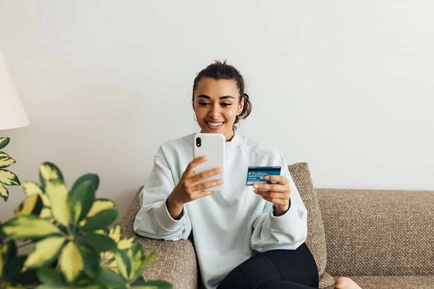  A lady making purchase using mobile